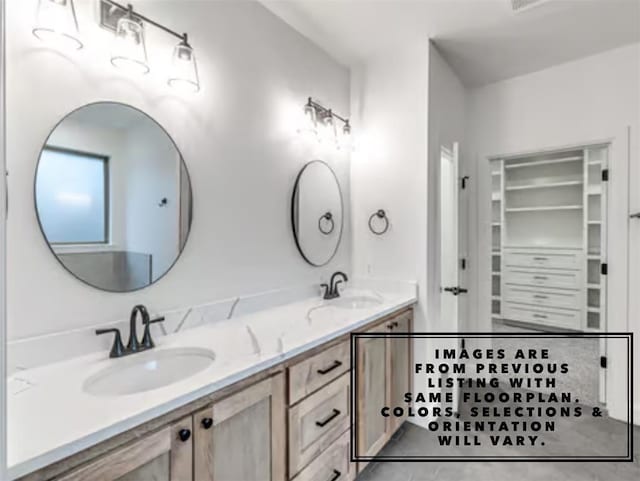 bathroom featuring vanity and tile patterned floors