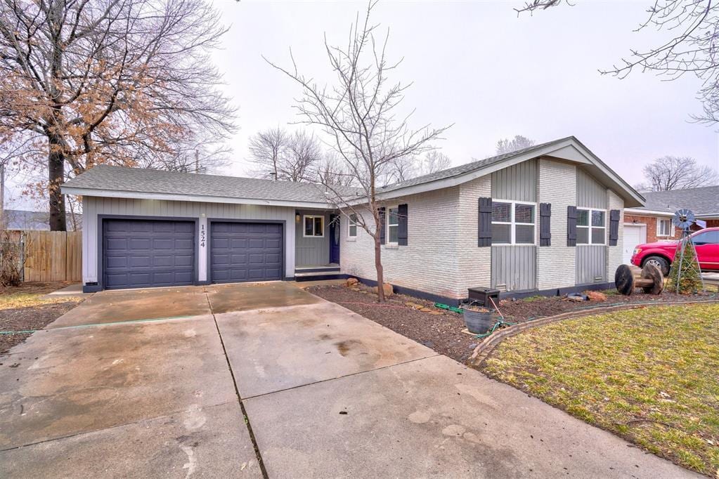 single story home featuring a garage