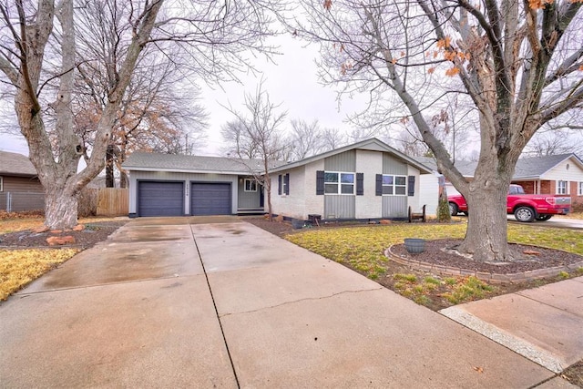 ranch-style home with a garage