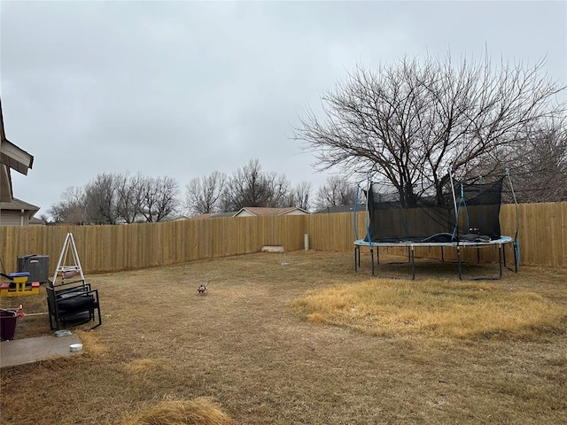 view of yard featuring a trampoline