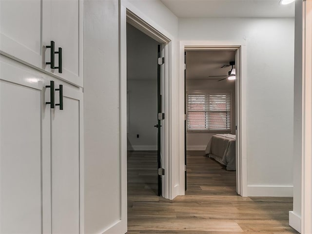 hall with light hardwood / wood-style floors