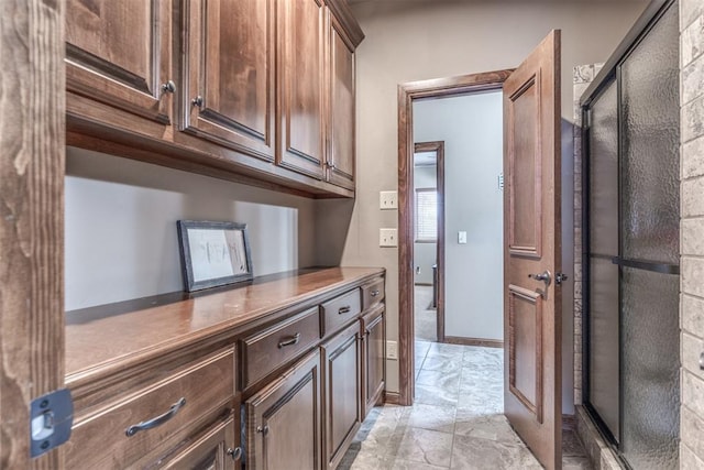 interior space with dark brown cabinets