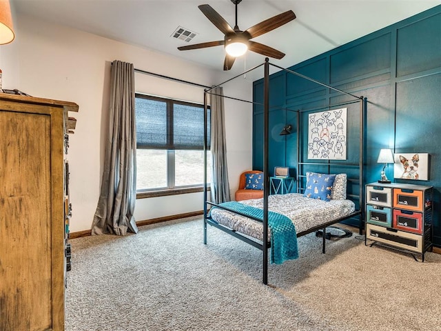 bedroom with ceiling fan and carpet flooring