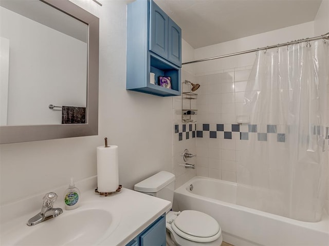 full bathroom with shower / tub combo with curtain, vanity, and toilet