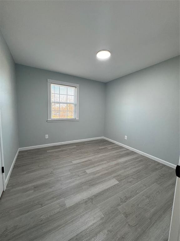 empty room with light hardwood / wood-style floors