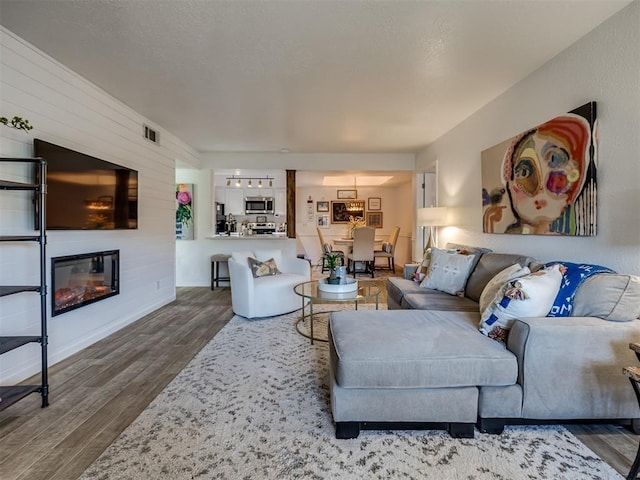 living room featuring hardwood / wood-style flooring