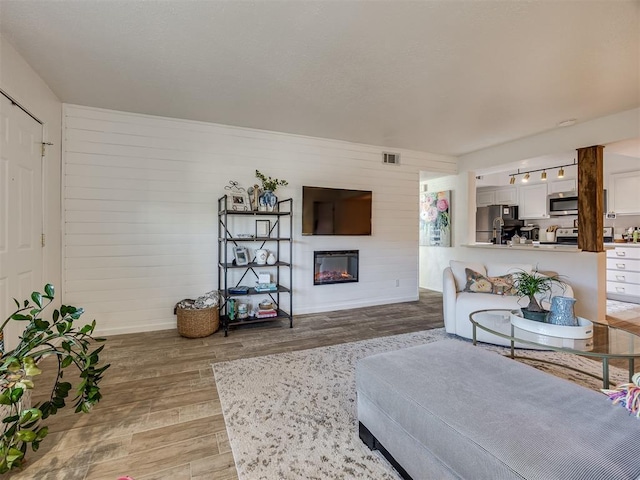 living room featuring light wood-type flooring