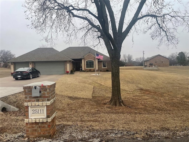 ranch-style house featuring a garage