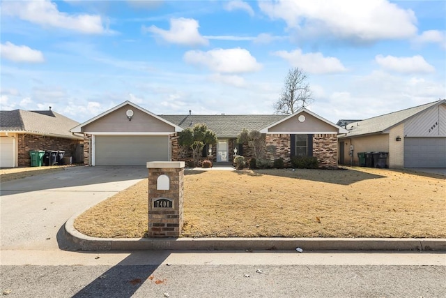 ranch-style house featuring a garage