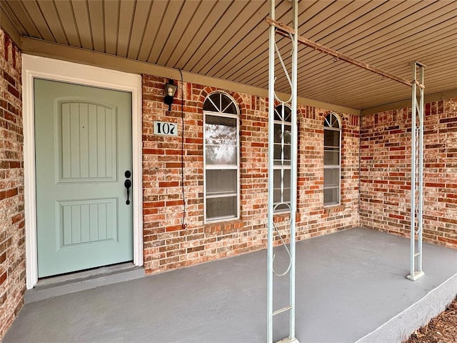 entrance to property with a porch