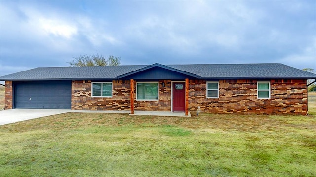 ranch-style house with a garage and a front yard