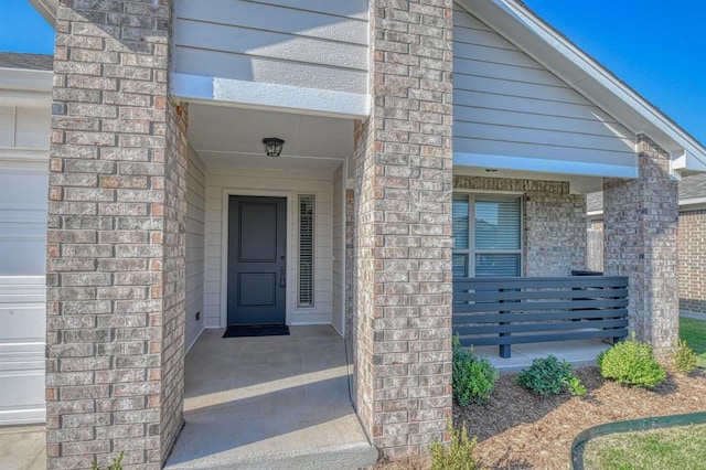 entrance to property with covered porch