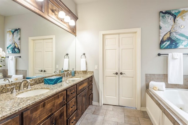 bathroom featuring vanity and tile patterned flooring