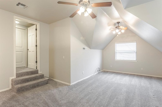 bonus room with vaulted ceiling, carpet floors, and ceiling fan