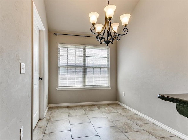 unfurnished dining area featuring an inviting chandelier and light tile patterned floors