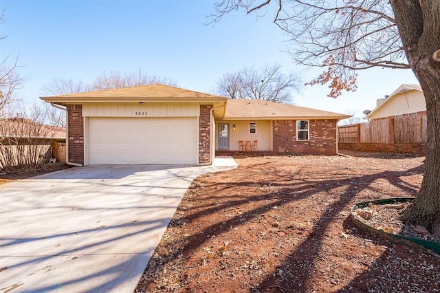 single story home with a garage