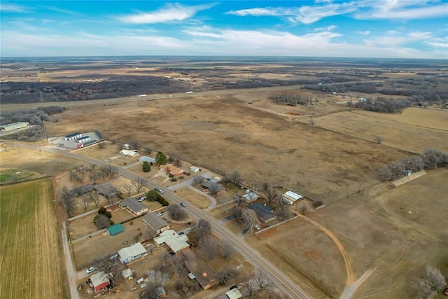 birds eye view of property featuring a rural view