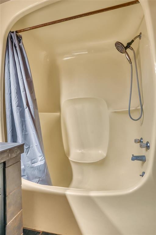 interior details with shower / bath combo with shower curtain