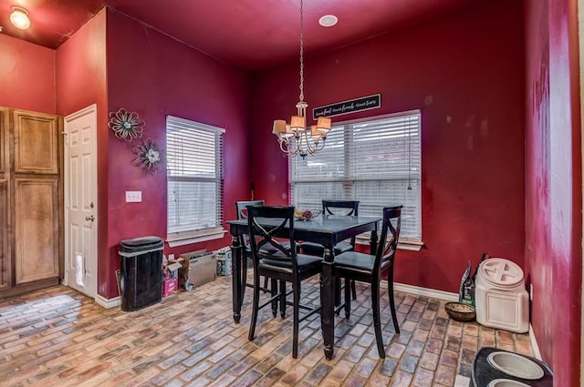 dining area with a chandelier