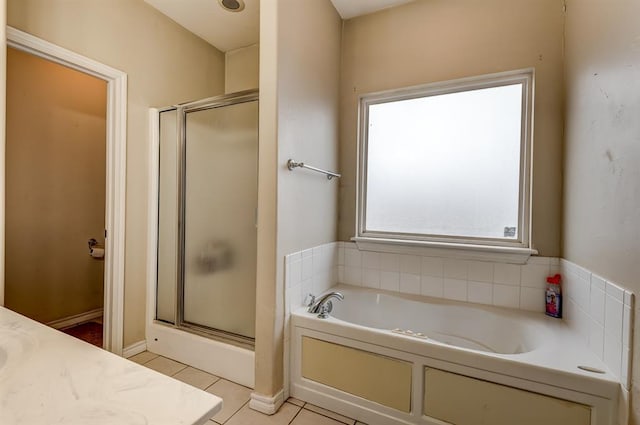 bathroom with vanity, tile patterned floors, and separate shower and tub