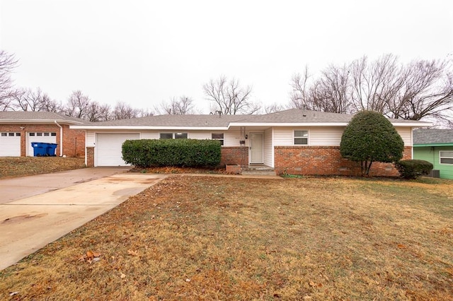 ranch-style house featuring a garage and a front yard