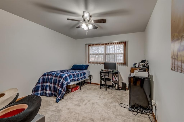 bedroom featuring ceiling fan and carpet flooring