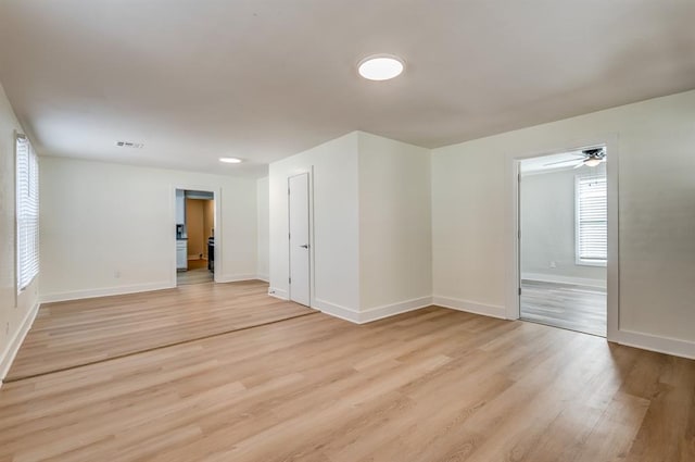 unfurnished room featuring light hardwood / wood-style flooring