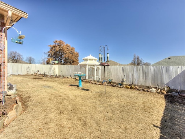 view of yard featuring a fenced backyard