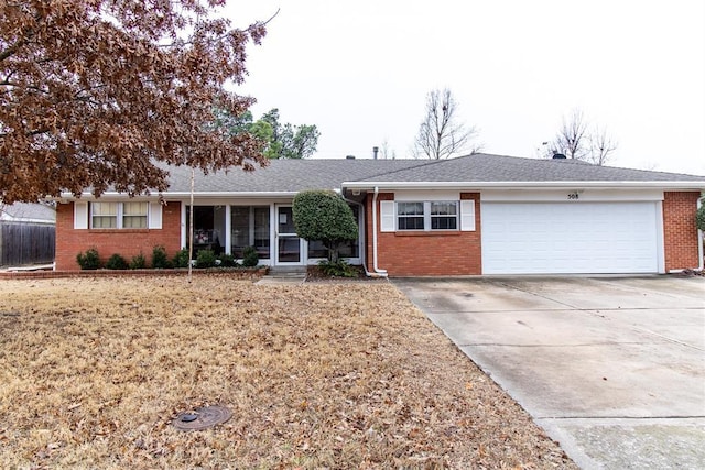 single story home featuring a garage