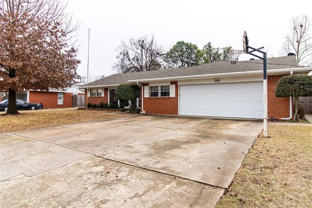 single story home featuring a garage