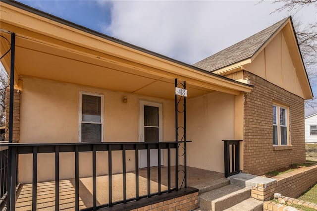 entrance to property with covered porch