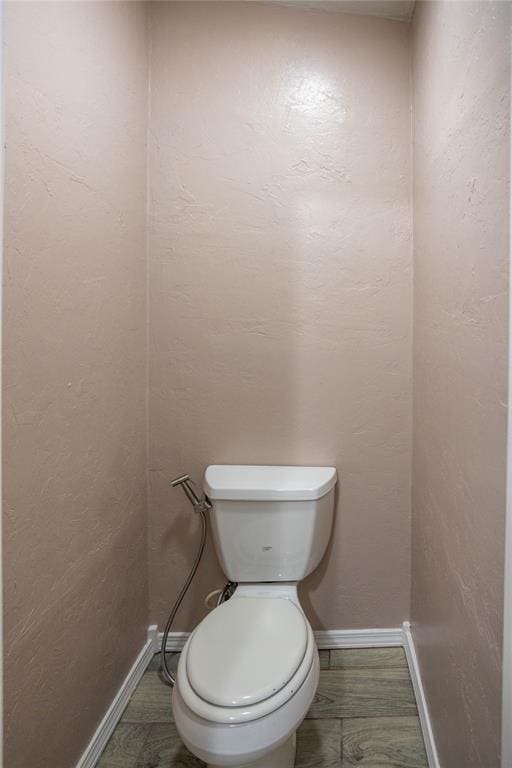 bathroom featuring toilet