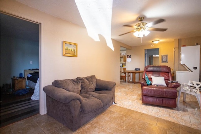 living room featuring ceiling fan