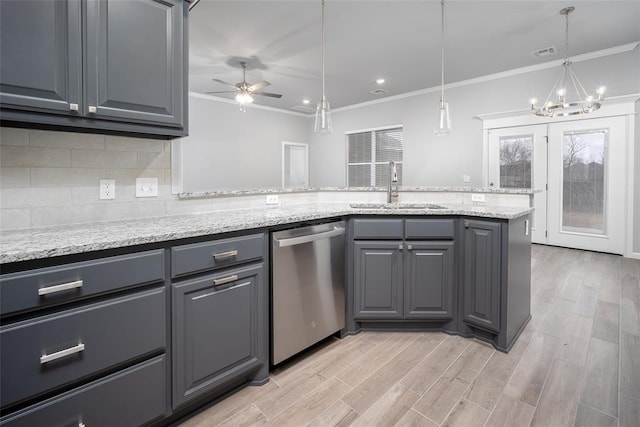 kitchen with sink, crown molding, dishwasher, gray cabinetry, and hanging light fixtures