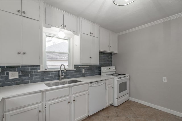 kitchen featuring light tile patterned flooring, white cabinetry, sink, decorative backsplash, and white appliances