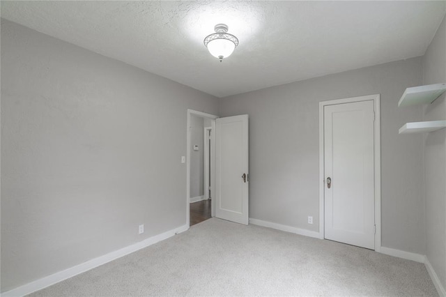 unfurnished bedroom with carpet