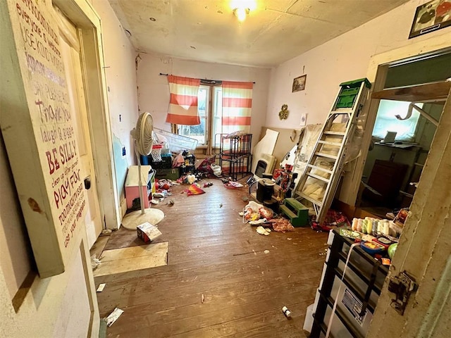 miscellaneous room featuring dark hardwood / wood-style floors