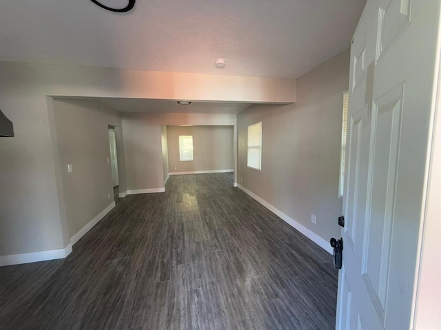 spare room featuring dark hardwood / wood-style floors