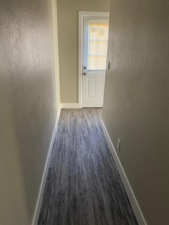 hall featuring dark hardwood / wood-style flooring