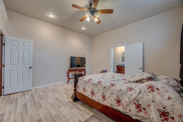 bedroom with ceiling fan and light wood-type flooring