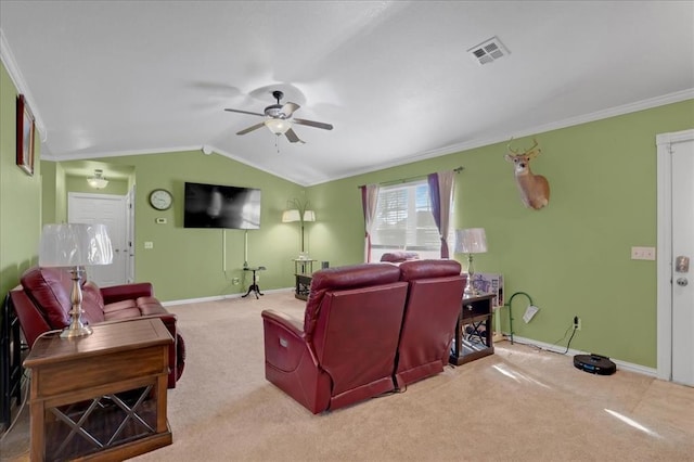 carpeted living room with baseboards, visible vents, ceiling fan, ornamental molding, and vaulted ceiling