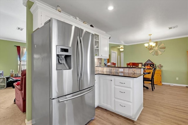 kitchen with white cabinetry, crown molding, a peninsula, and stainless steel fridge with ice dispenser