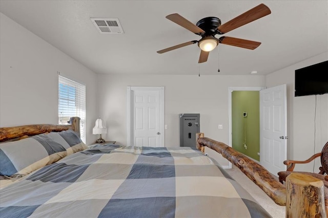 bedroom featuring visible vents and a ceiling fan