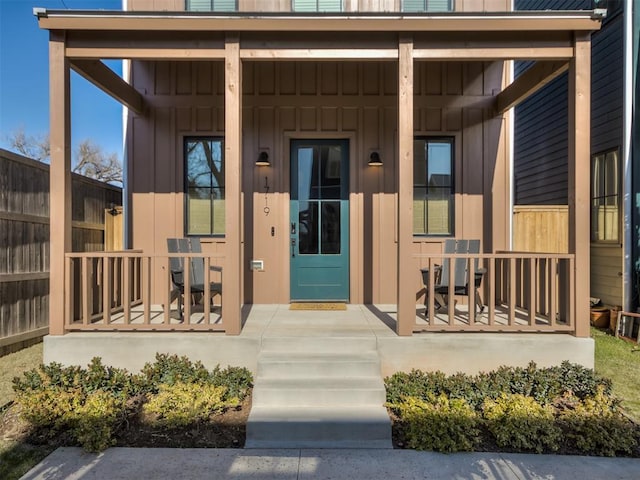 doorway to property featuring a porch