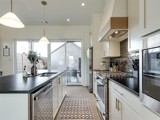 kitchen featuring custom exhaust hood, white cabinetry, and appliances with stainless steel finishes