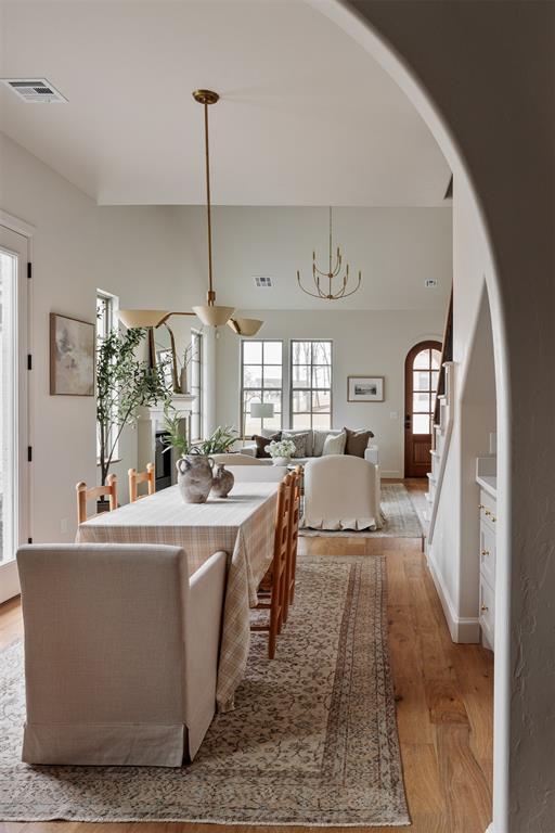 dining area featuring light wood-type flooring