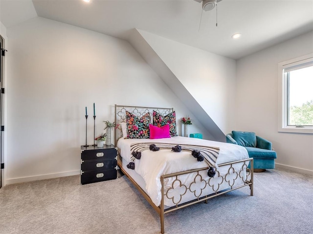 carpeted bedroom with vaulted ceiling, ceiling fan, recessed lighting, and baseboards