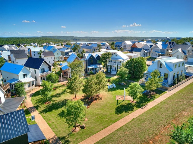 birds eye view of property with a residential view