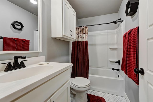 full bathroom with shower / tub combo with curtain, vanity, toilet, and tile patterned flooring