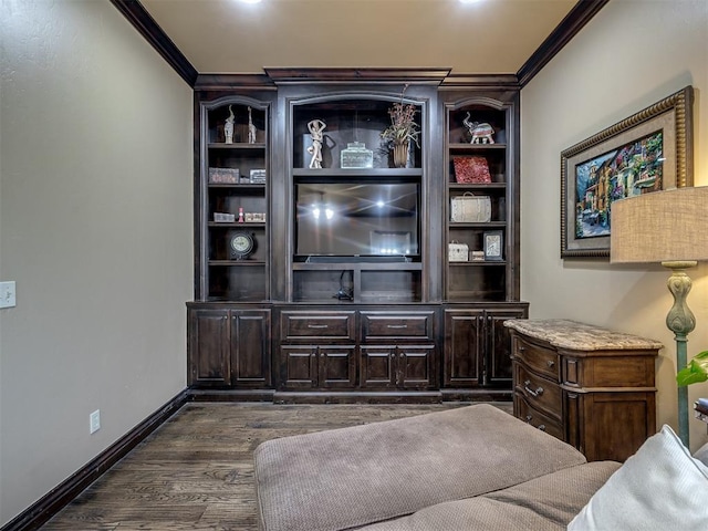 living room with dark hardwood / wood-style flooring and ornamental molding